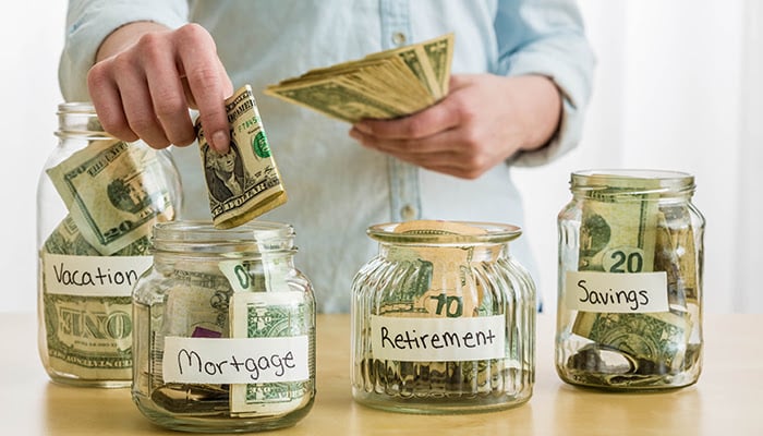Putting money on jars