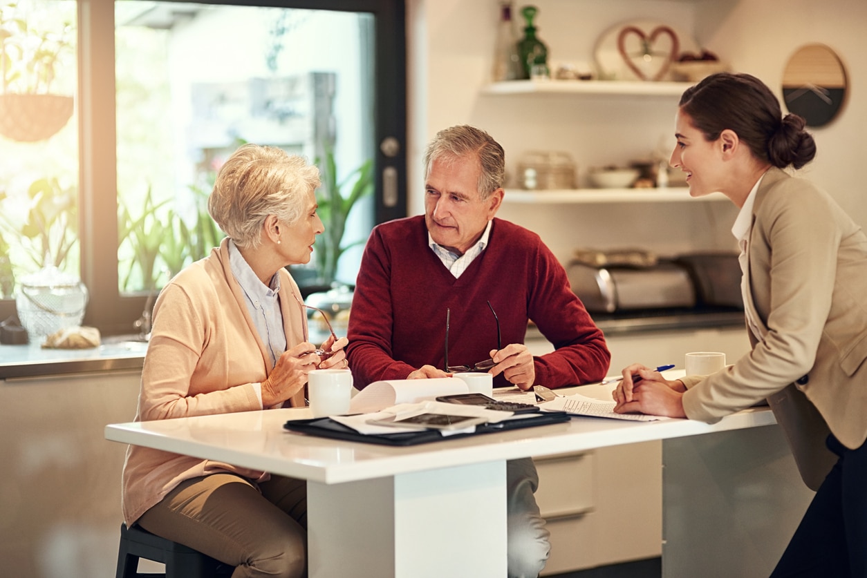 older couple having financial advise